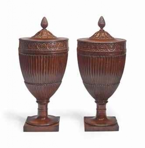 A Pair of George III Carved Mahogany Dining Urns
